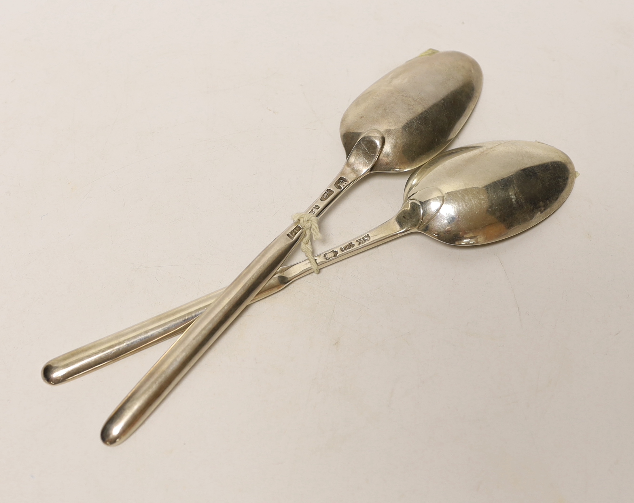 Two 18th century silver combination marrow scoop spoons, London, 1766 and Samuel Roby, London, circa 1745, 22.6cm, 130 grams.